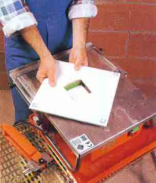 Picture of wet saw cutting.